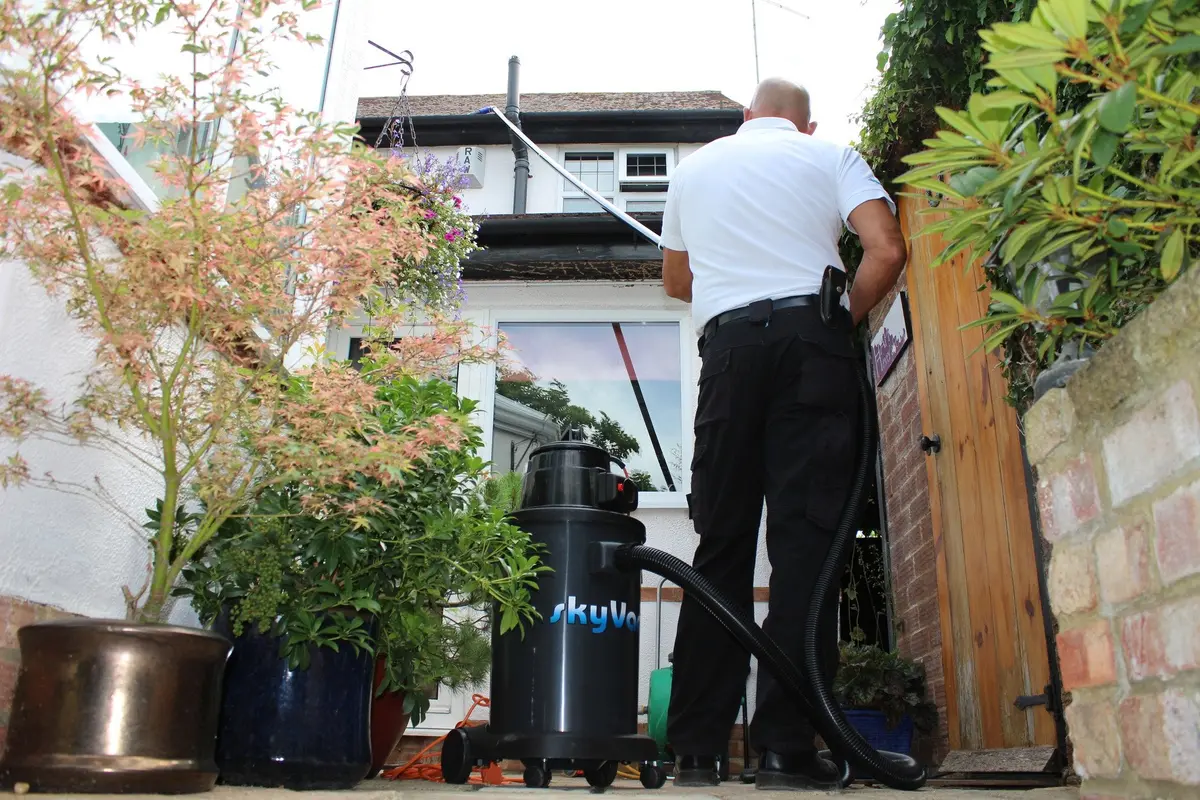 Skyvac®️ Action Photo - Gutter Cleaning Residential - Atom 1